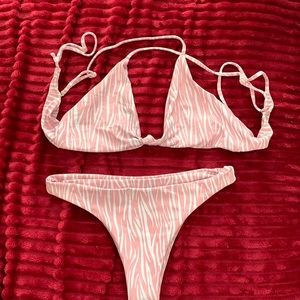 Skatie bikini pink and white zebra print sexy bikini. Super cheeky bottom